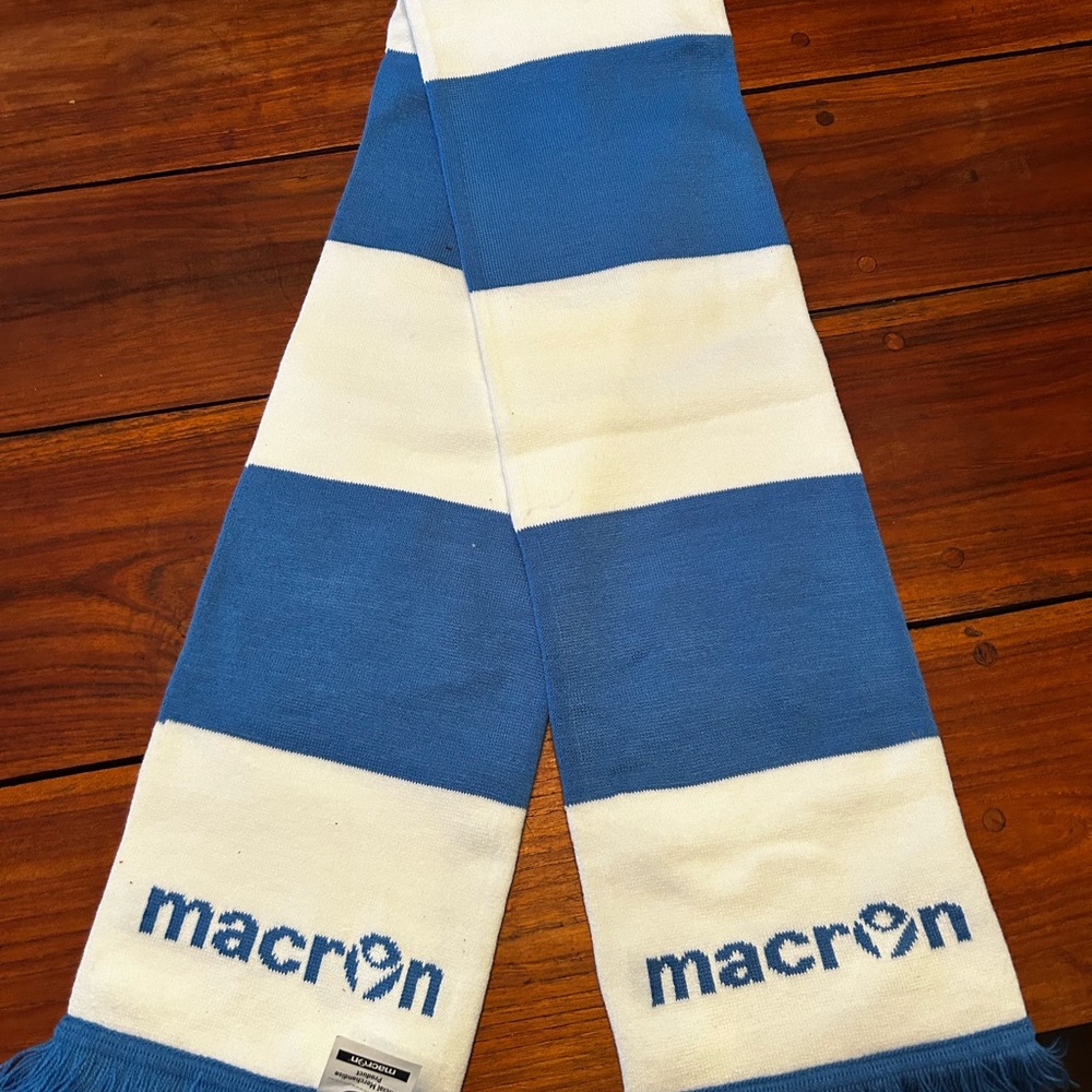 Blue & white acrylic scarf with fringe ends. New without tags... never worn.